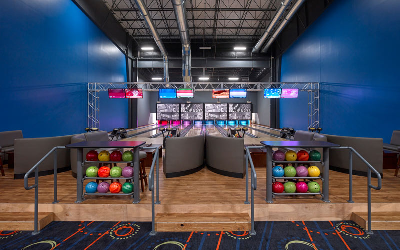 A view of the modern, 6-lane bowling alley at Arena Sports