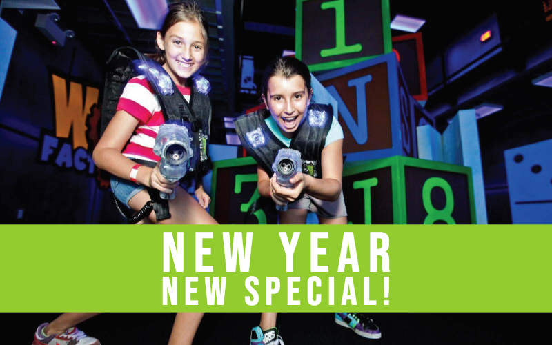Two girls playing laser tag at Arena Sports