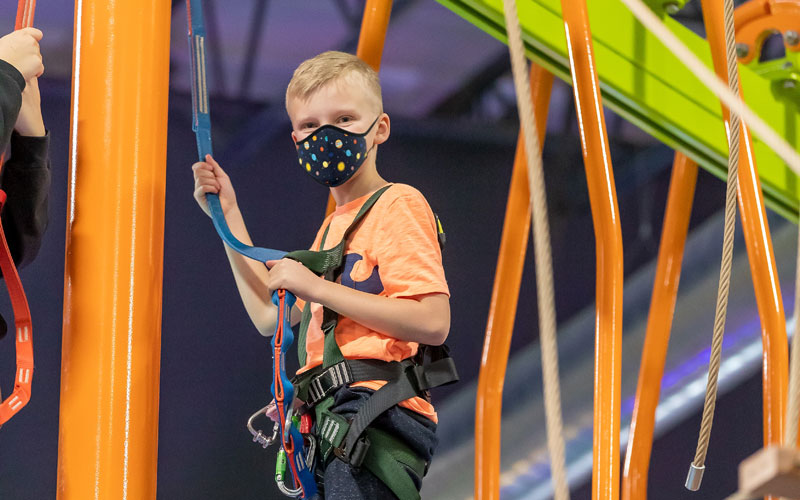 arena-sports-mill-creek-ropes-course-kid-with-mask
