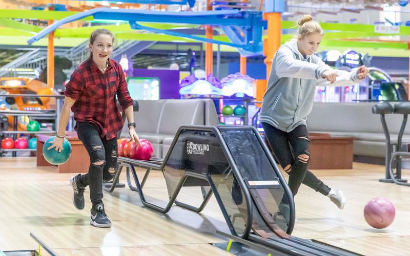 Boys smiling at Birthday Parties bowling