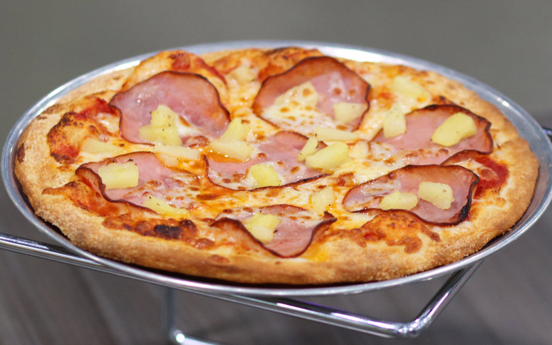 small canadian bacon and pineapple pizzas