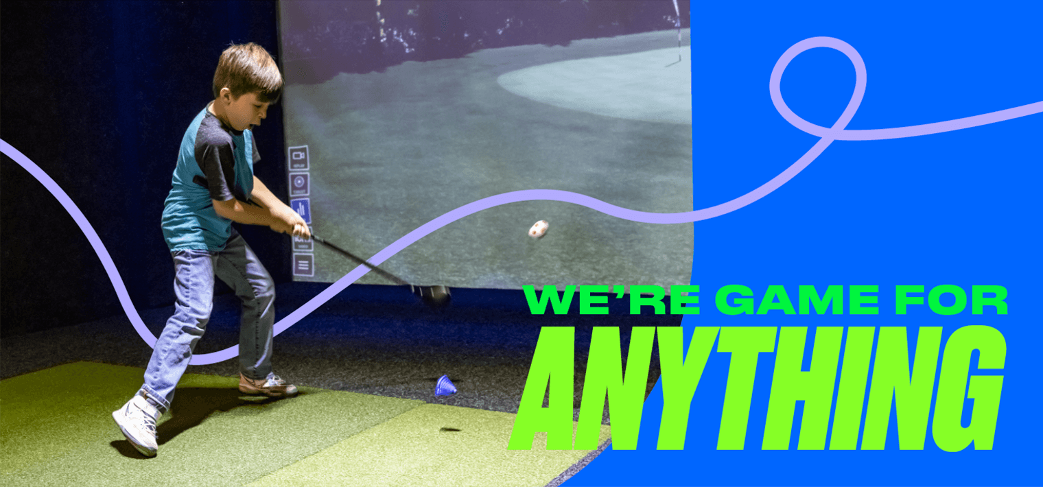 ISS-HP Child plays golf in the Sports Simulator at Arena Sports Issaquah