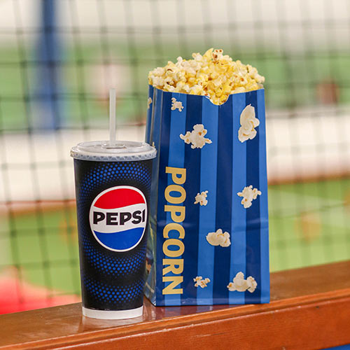 A bag of popcorn and a soda from the snack bar at Arena Sports Magnuson