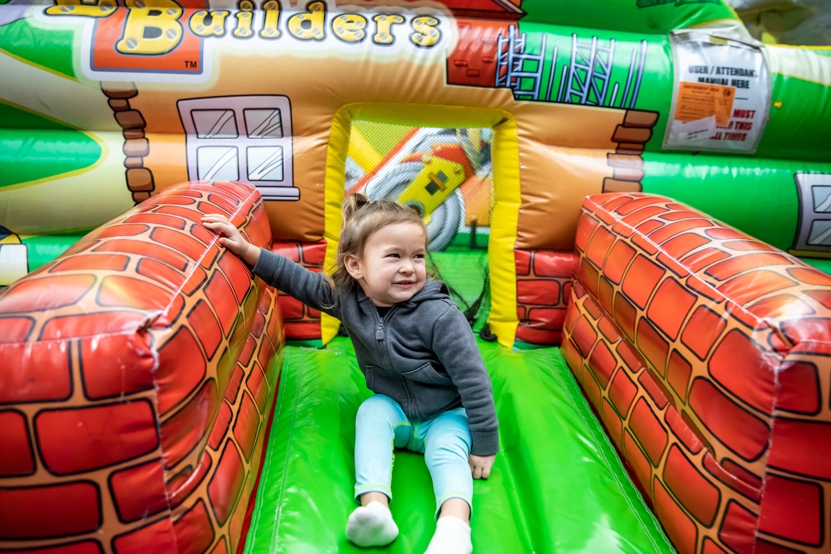 Young child playing in the toddler zone of the Inflatable FunZone