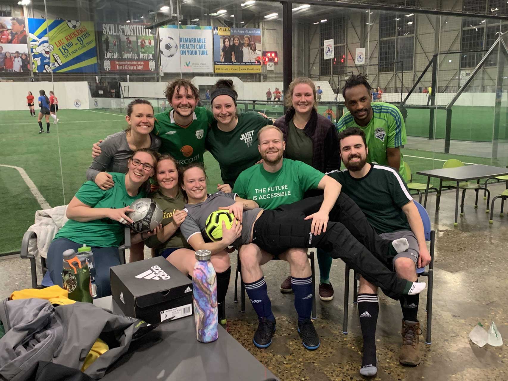 Team celebrating after adult league game at Arena Sports.