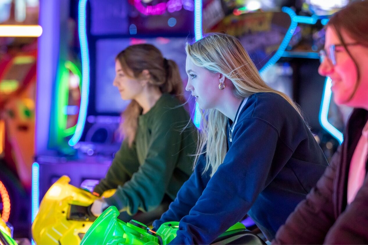 people playing arcades